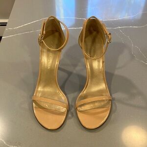 Stuart Weitzman Nude Patent Stiletto. Patent leather with leather insole.